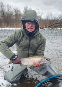 featured is Karl with a typical Steelhead for this time of the year